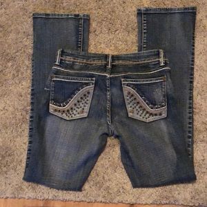 Jeans/ grommets & factory distressed